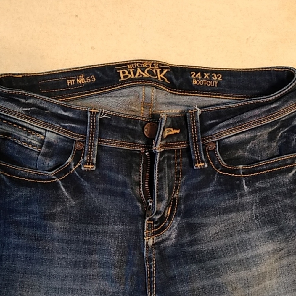 Buckle black bootcut jeans 24x32